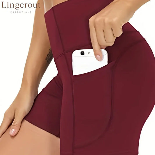 High-waist side-pocket yoga shorts stretchable tummy-reducing sports shorts
