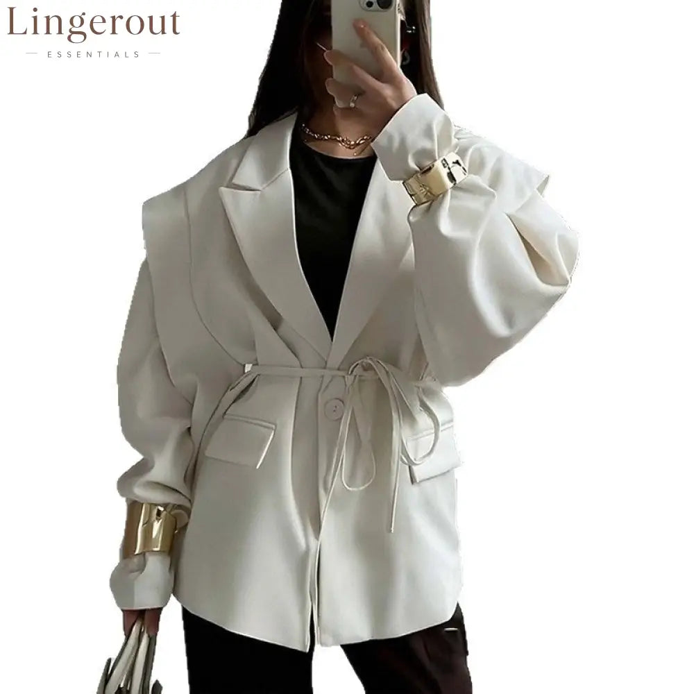 Oversized belted blazer with puff sleeves – Modern and sophisticated elegance