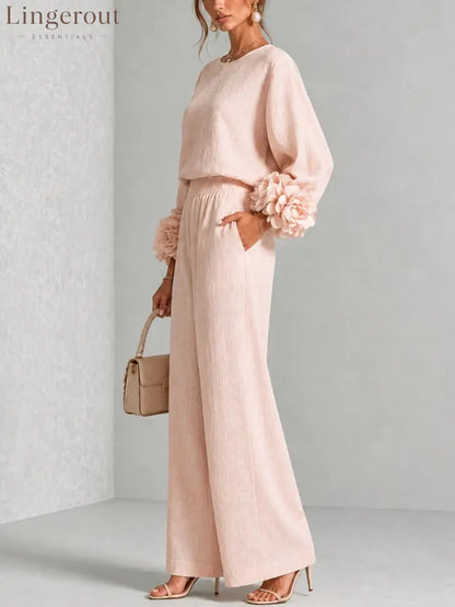 Pink Top Featuring Striking Floral Cuffs Paired With Wide-leg Pants Suit