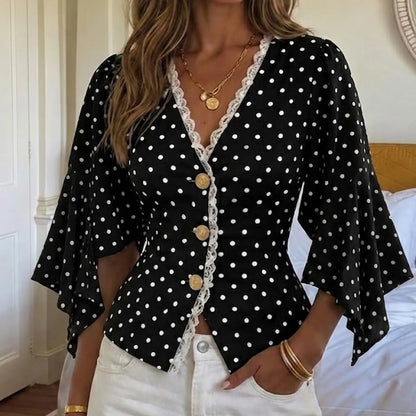 Blouse noire à pois blancs et boutons dorés SecretBombe