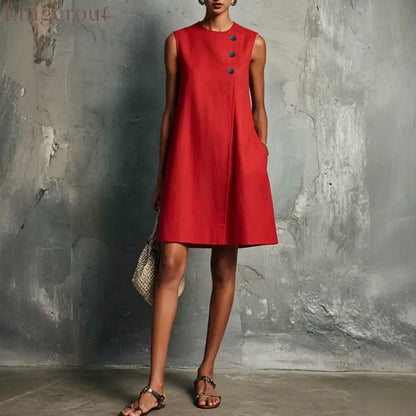 The Sculptural Button Shift Mini Dress