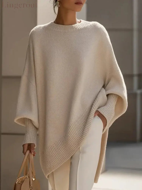 Women’s Solid Beige Asymmetric Batwing Sleeve Knit Poncho Sweater - Apricot / XS